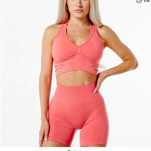 Alphalete Stratus Sports Bra in Pixel Pink Size XS